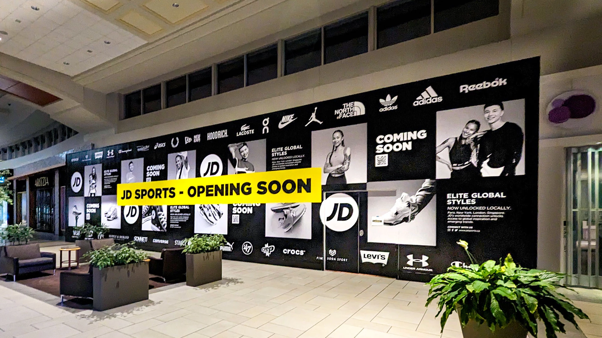 Mall construction hoarding graphic install JD Sports Calgary
