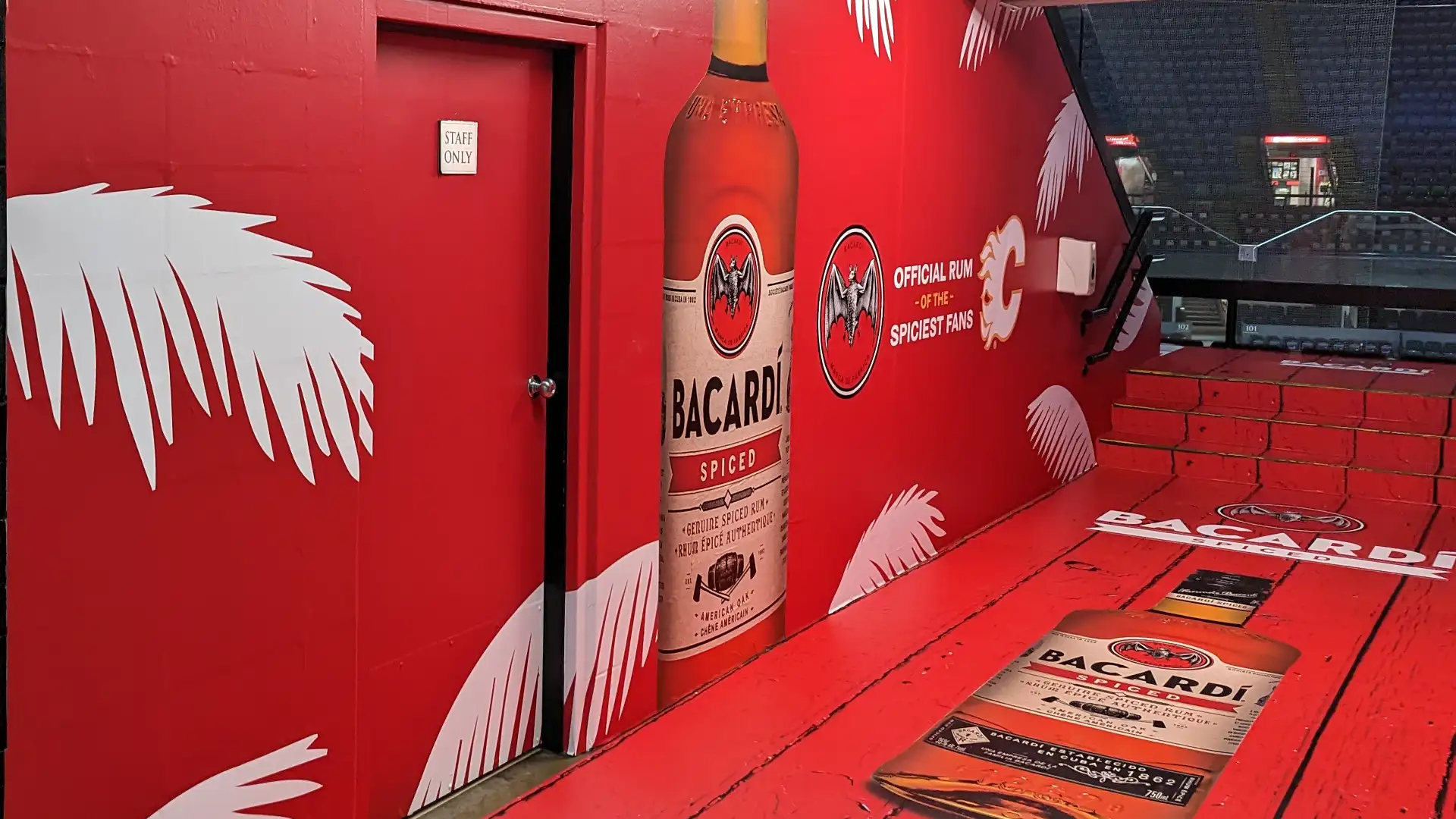 Bacardi wall and floor graphic install at Scotiabank Saddledome, Calgary