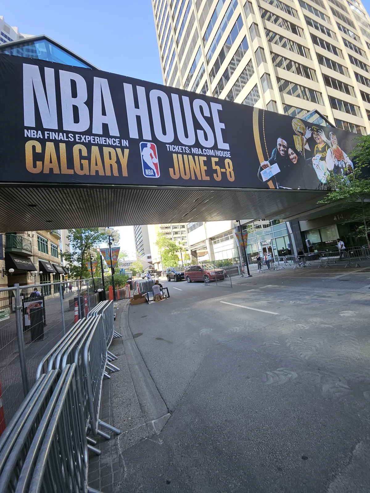 Overpass banner installation downtown Calgary — large format exterior